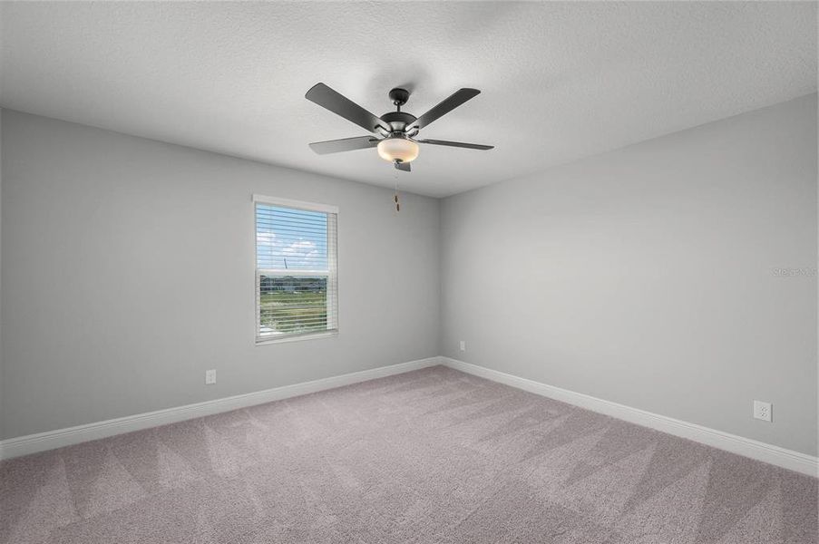 Spacious, unfurnished interior of a new home in Gum Lake Preserve, Lake Alfred (Image 25).