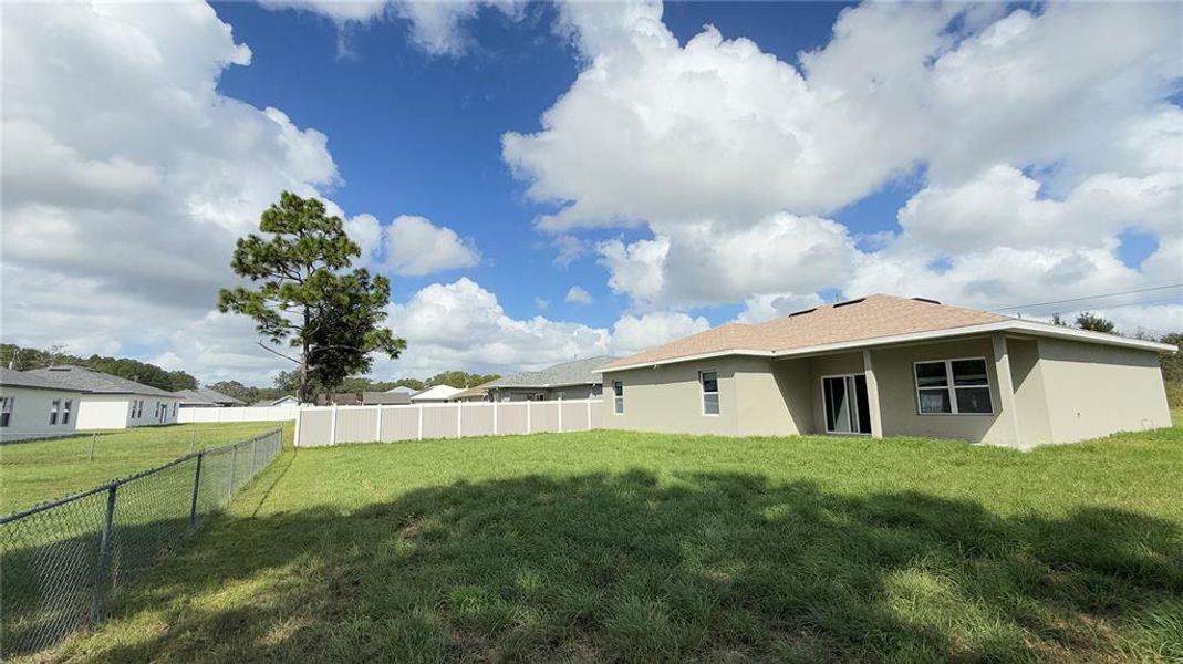 Exterior details and patio area of a home in , Ocala (Image 3).