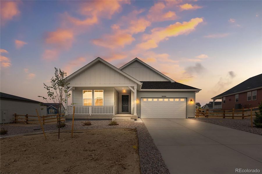 Front exterior of a new home in Independence, Elizabeth, CO, highlighting curb appeal (Image 18). Front exterior of a new home in Independence, Elizabeth, CO, highlighting curb appeal (Image 18).