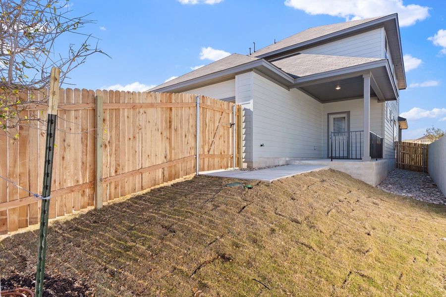 Exterior details and patio area of a home in Sage Hollow, Kyle (Image 3). Exterior details and patio area of a home in Sage Hollow, Kyle (Image 3).