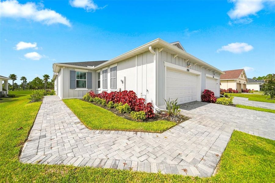 Exterior details and patio area of a home in The Timbers at Everlands, Palm Bay (Image 3).