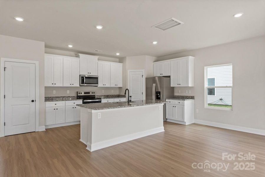 Furnished interior view inside a new home in Ascot Woods, Charlotte (Image 5).