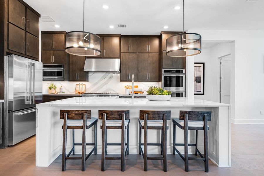 Furnished interior view inside a new home in Travisso, Leander (Image 7).