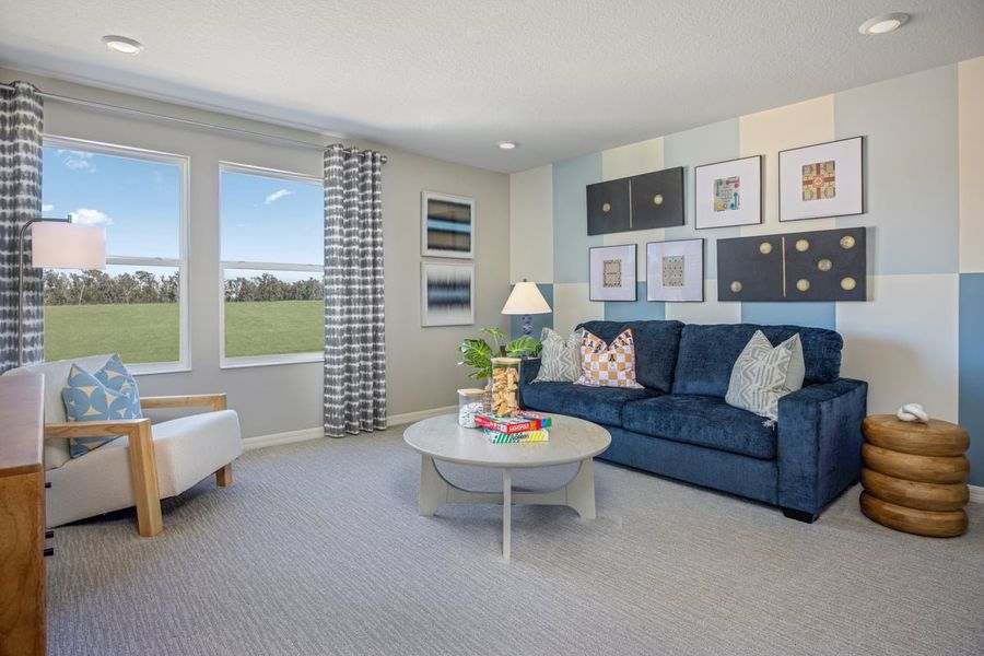 Representative furnished interior of a home built from the 2566 Modeled by KB Home in Chapel Manor II, Zephyrhills (Image 8).