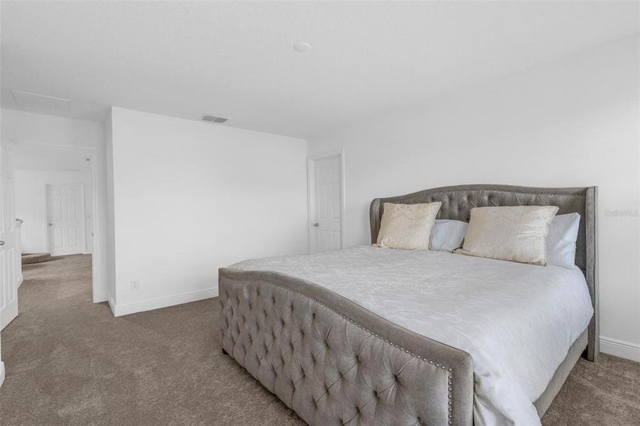 Furnished interior view inside a new home in Ridgeview, Clermont (Image 22).