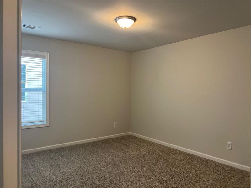 Spacious, unfurnished interior of a new home in Crofton Place Enclave, Snellville (Image 27).