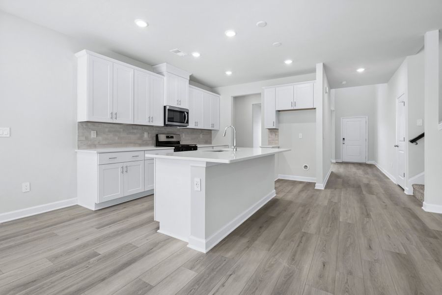 Furnished interior view inside a new home in Waterside - Coastline Series, Longs (Image 2).