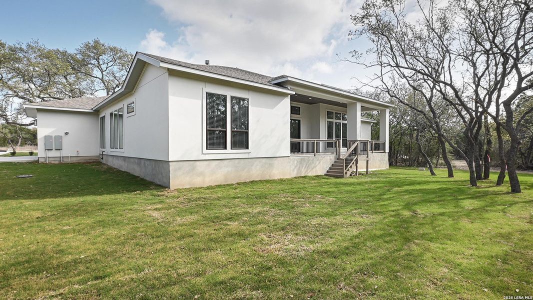 Exterior details and patio area of a home in Thornebrook, Bulverde (Image 23).
