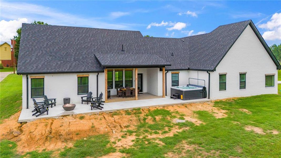 You can truly enjoy the outdoors with this patio!  Quiet conversations around the firepit, grilling and dining in the fresh air, and a glass of wine in the hot tub to round out the perfect day!