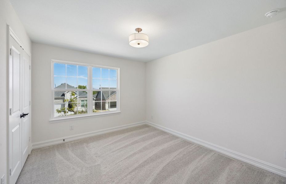 Spacious, unfurnished interior of a new home in Rosemary Fields, Godley (Image 19). Spacious, unfurnished interior of a new home in Rosemary Fields, Godley (Image 19).