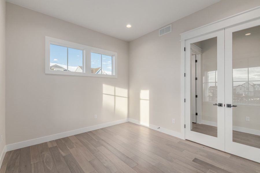 Representative unfurnished interior of a home built from the Luxe by Scott Felder Homes in Westerly, Erie (Image 38).