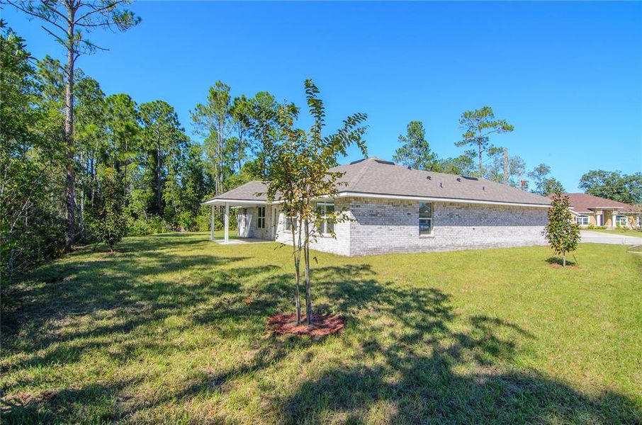 Exterior details and patio area of a home in Palm Coast, Palm Coast (Image 3).