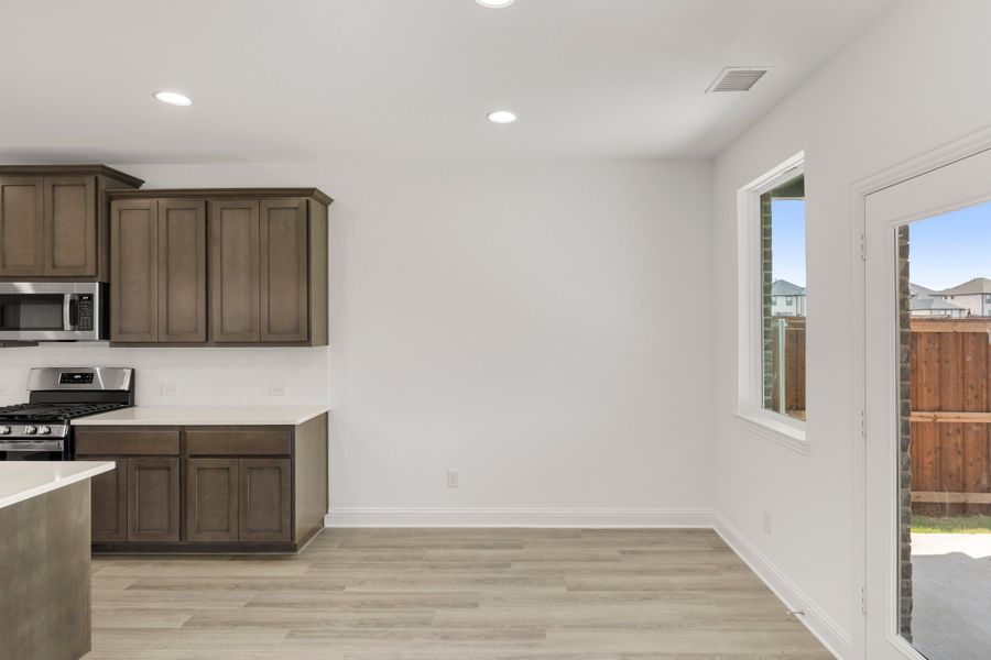 Furnished interior view inside a new home in Creekside, Royse City (Image 9).