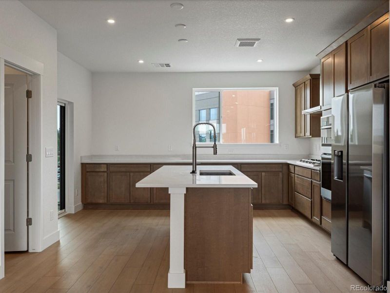 Furnished interior view inside a new home in Ascent at Inverness, Englewood (Image 10).