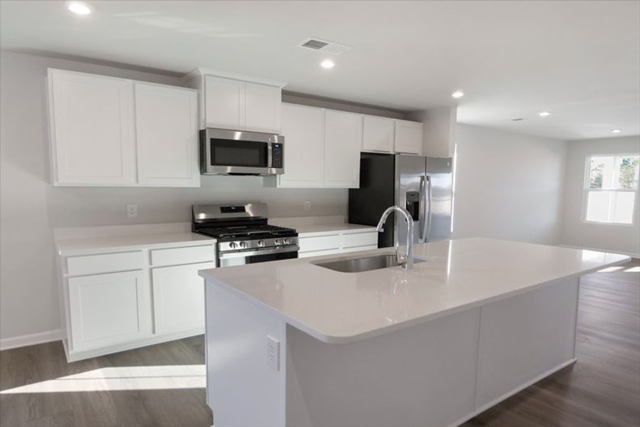 Furnished interior view inside a new home in Wren Woods 2-Story, Gray Court (Image 5).