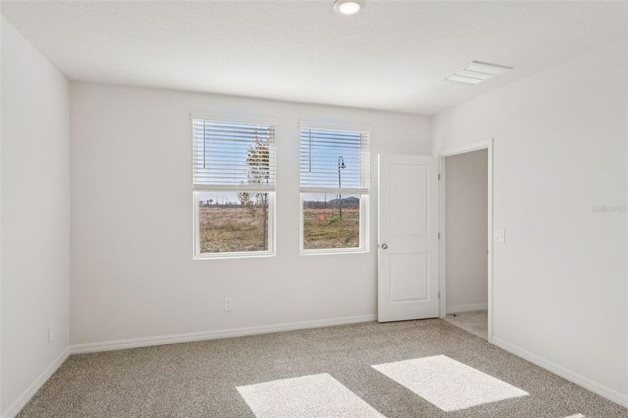 Spacious, unfurnished interior of a new home in Crosswinds - Classic Series, Haines City (Image 19).