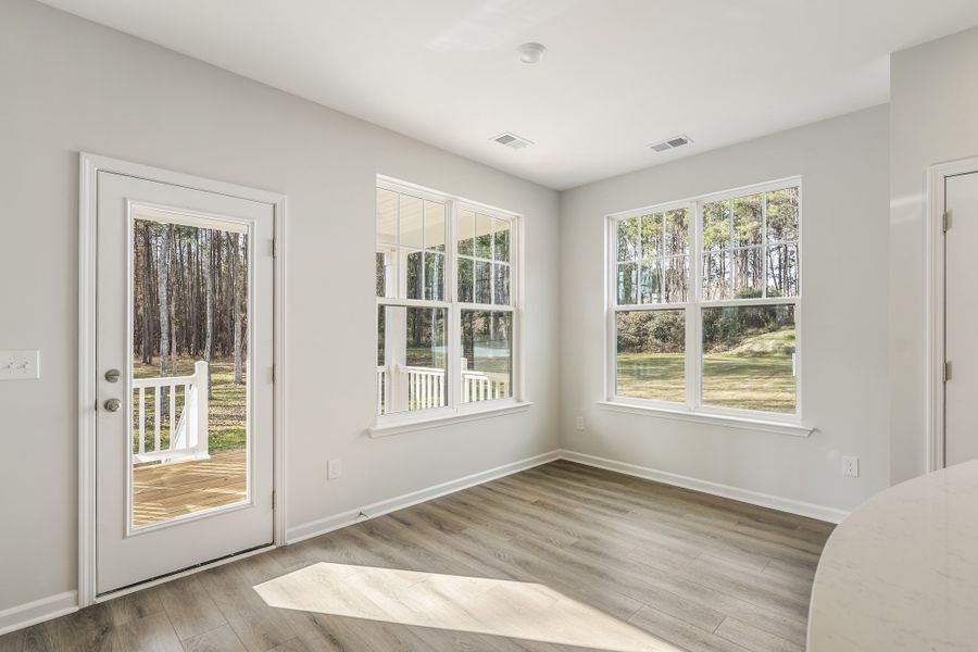 Spacious, unfurnished interior of a new home in Landing at Pine Lake, Anderson (Image 22).