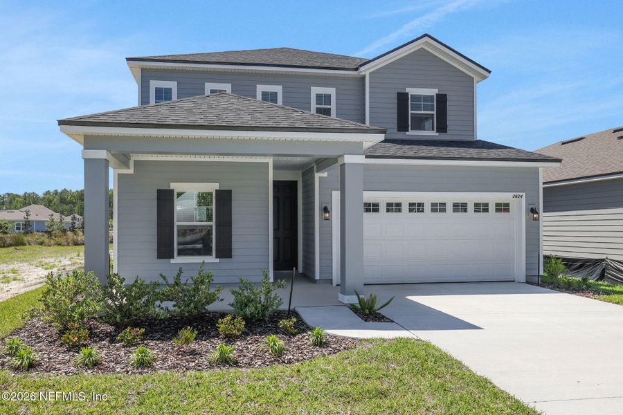 Front exterior of a new home in Hyland Trail, Green Cove Springs, FL, highlighting curb appeal (Image 23).