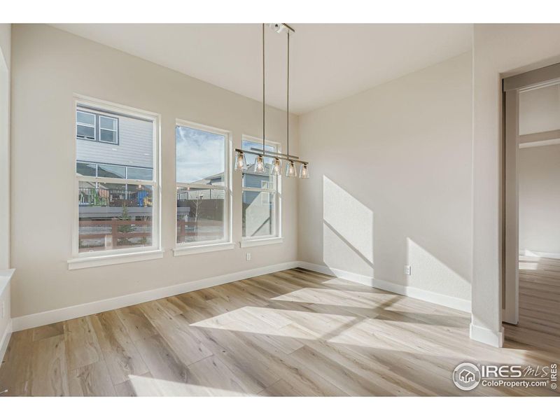 Spacious, unfurnished interior of a new home in RainDance National 60/70, Windsor (Image 14).