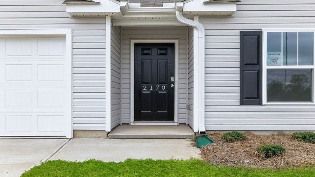 Exterior details and patio area of a home in Hunters Ridge, Woodruff (Image 3).