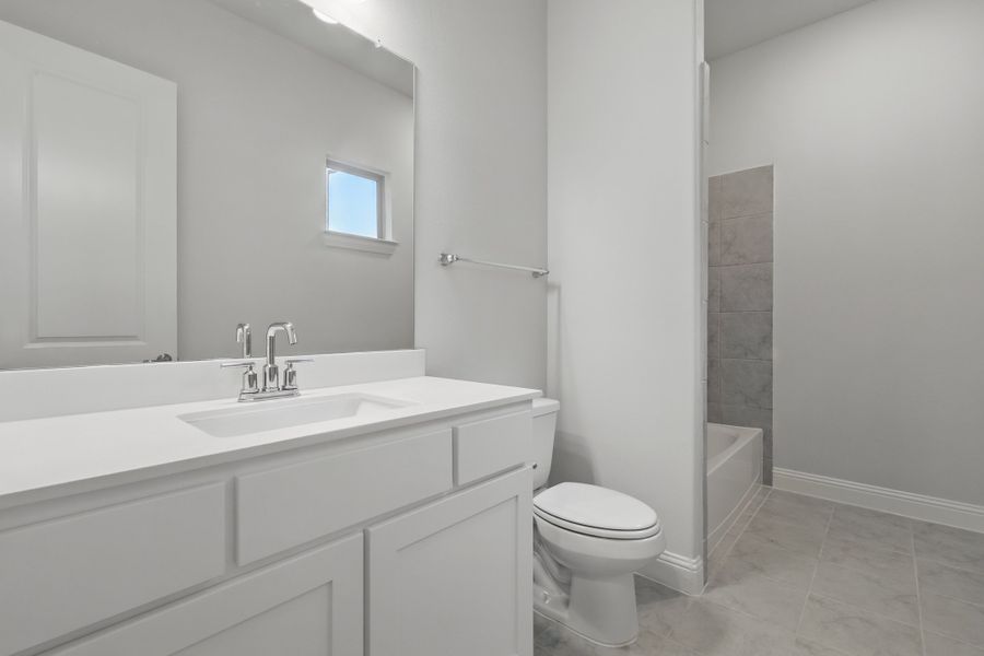 Representative furnished interior of a home built from the Classic Series - Vanderbilt by DRB Homes in Oaks at San Gabriel, Georgetown (Image 41).