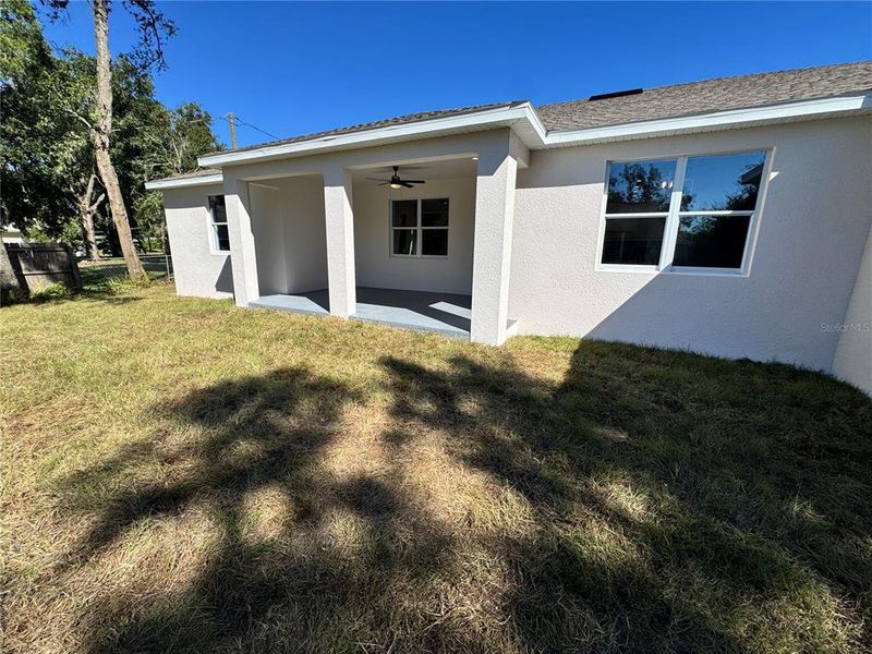 Exterior details and patio area of a home in , Dade City (Image 37).