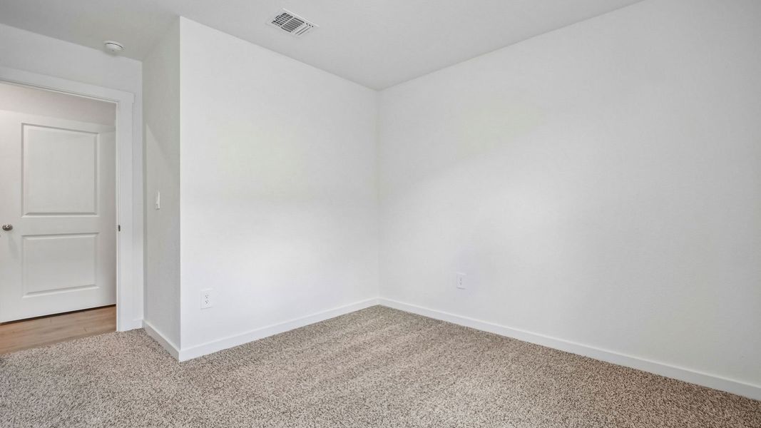 Spacious, unfurnished interior of a new home in Trails at Wildhorse, Austin (Image 34).