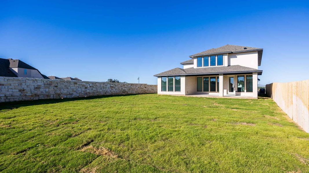 Exterior details and patio area of a home in Eldorado At Santa Rita Ranch 60', Liberty Hill (Image 3).
