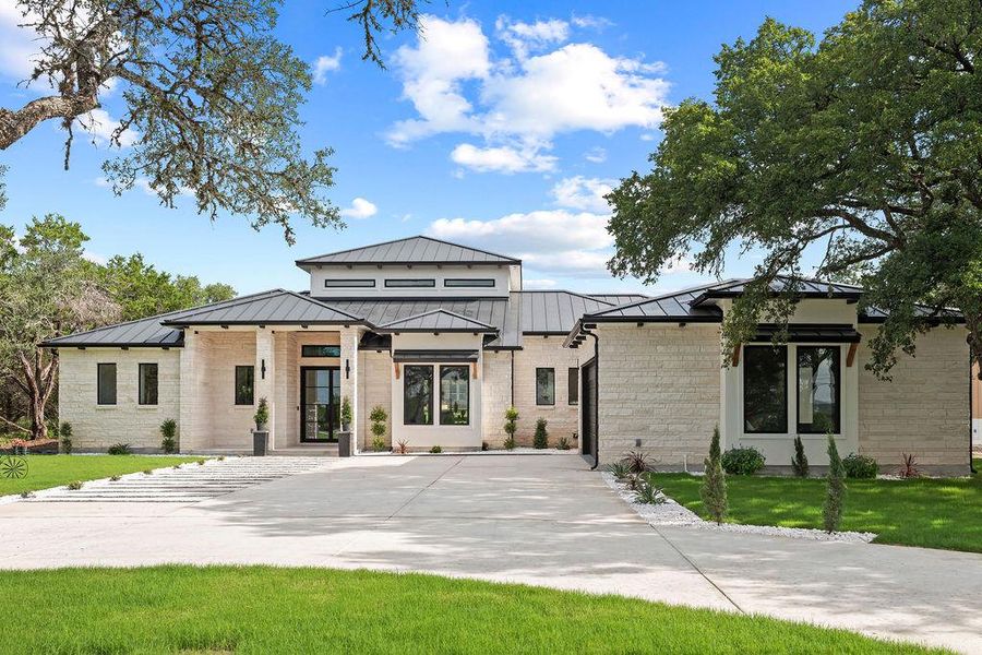 Front exterior of a new home in , Canyon Lake, TX, highlighting curb appeal (Image 1). Front exterior of a new home in , Canyon Lake, TX, highlighting curb appeal (Image 1).