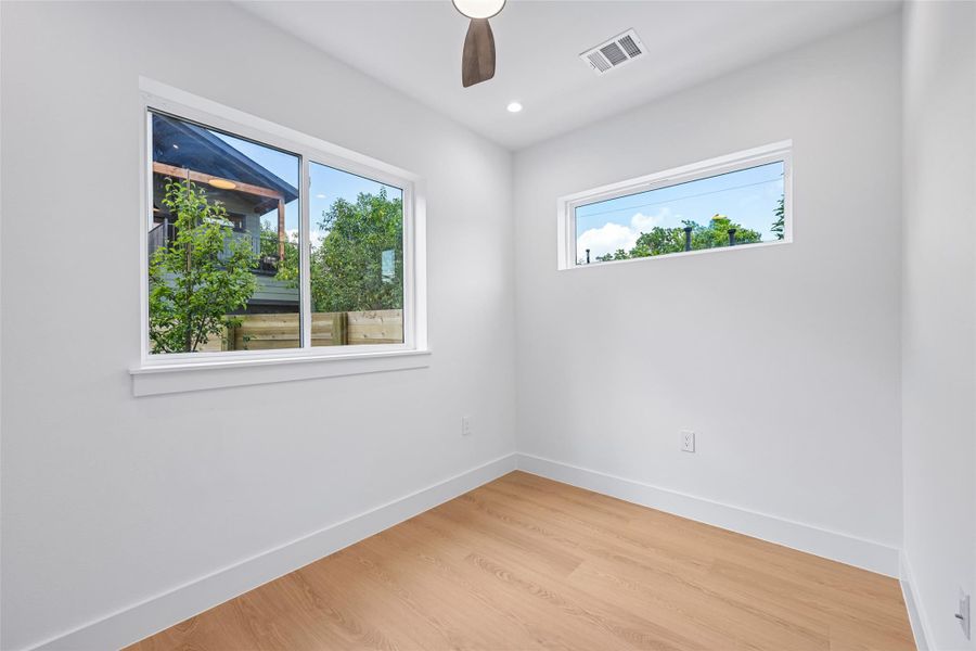 This first floor bedroom is pre-wired with GFiber internet to be used as a home office if desired.