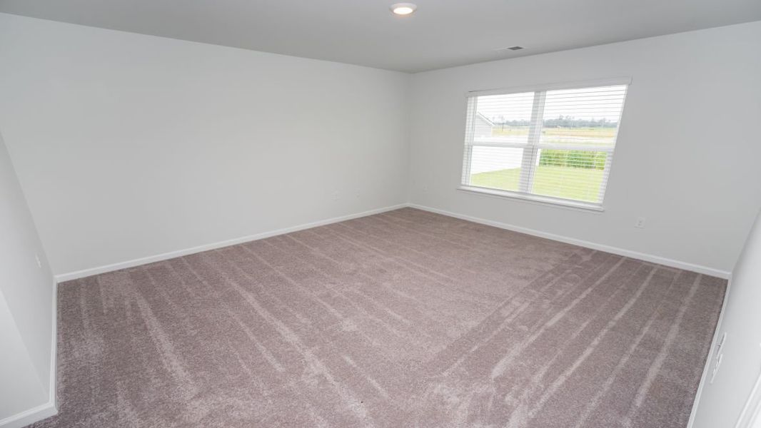 Representative unfurnished interior of a home built from the ARIA by D.R. Horton in The Meadows at Wildwood Village, Shallotte (Image 26). Representative unfurnished interior of a home built from the ARIA by D.R. Horton in The Meadows at Wildwood Village, Shallotte (Image 26).