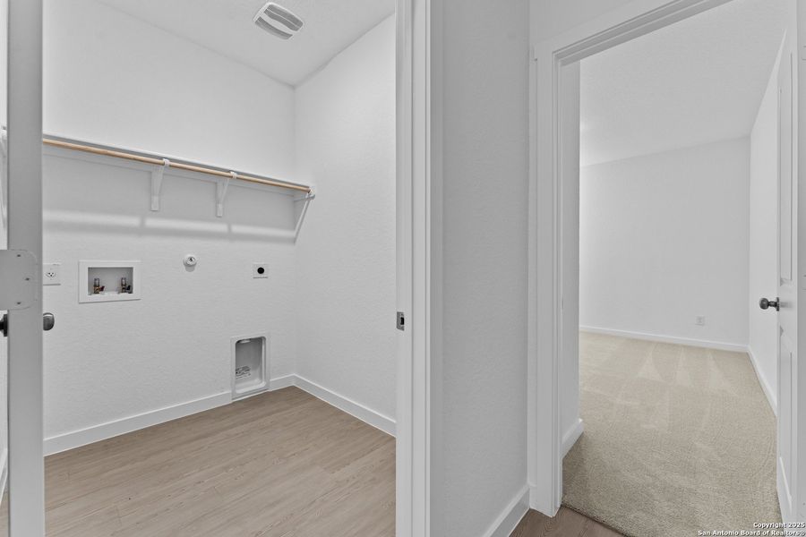 Spacious, unfurnished interior of a new home in Hidden Trails: Coastline Collection, Bulverde (Image 21).