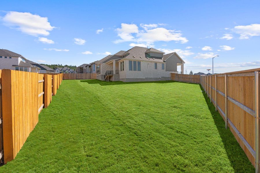 Rear of Home and Private Backyard