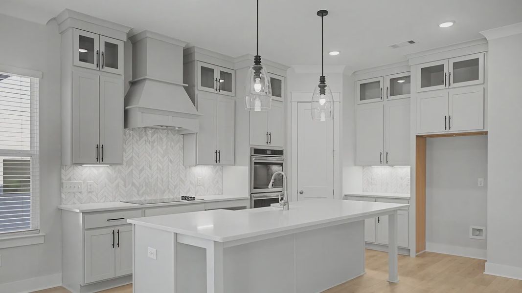 Kitchen with floor to ceiling cabinets, quartz countertops, tile backsplash, and vent hood Kitchen with floor to ceiling cabinets, quartz countertops, tile backsplash, and vent hood