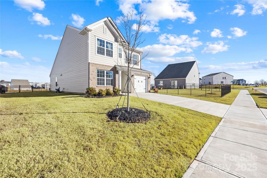 Front exterior of a new home in , Statesville, NC, highlighting curb appeal (Image 20).