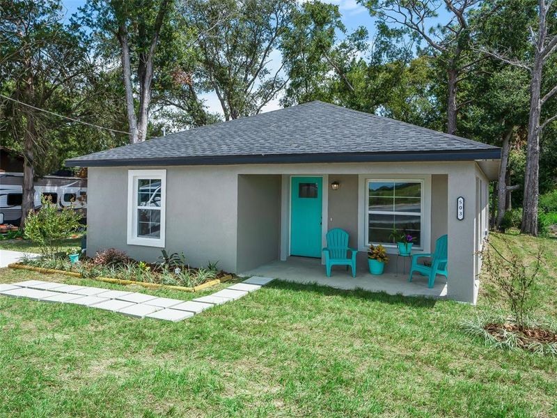 Front exterior of a new home in , Ocala, FL, highlighting curb appeal (Image 2). Front exterior of a new home in , Ocala, FL, highlighting curb appeal (Image 2).