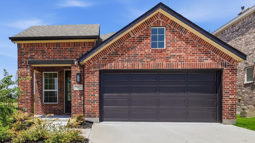 Front exterior of a new home in Bel Air Village, Sherman, TX, highlighting curb appeal (Image 1). Front exterior of a new home in Bel Air Village, Sherman, TX, highlighting curb appeal (Image 1).
