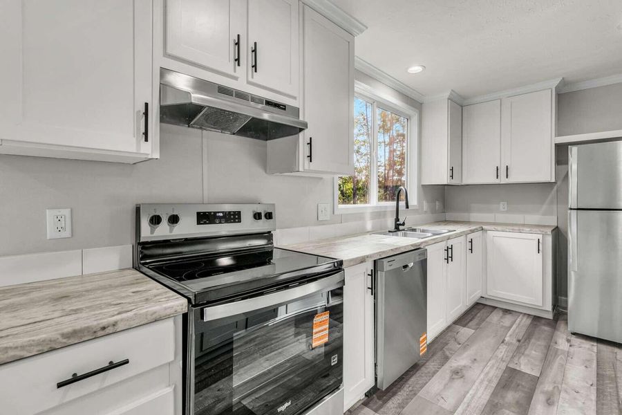 Furnished interior view inside a new home in , Holly Hill (Image 4).