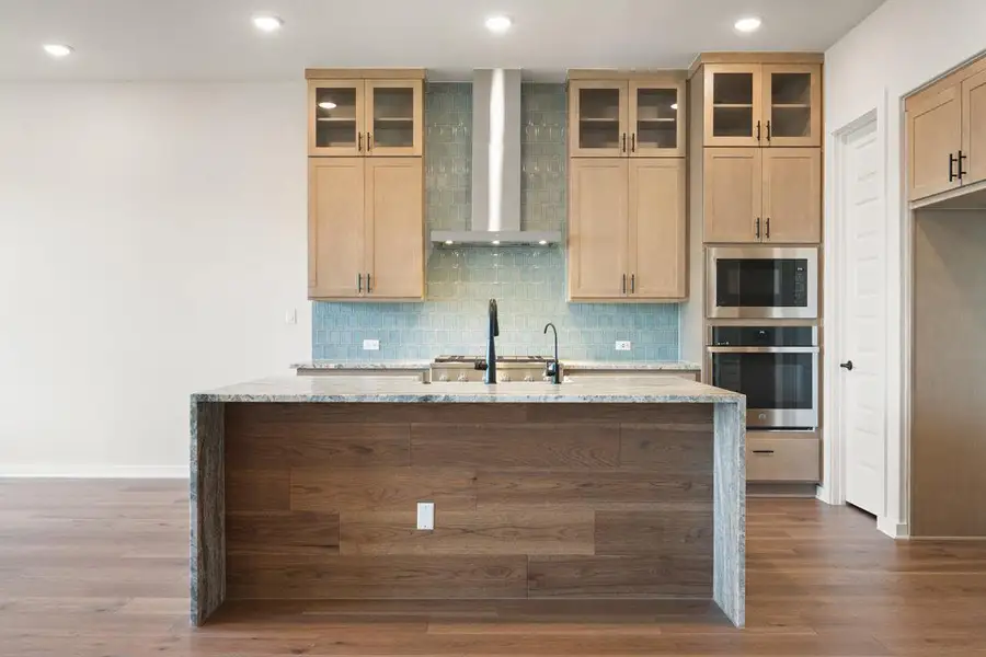Furnished interior view inside a new home in Park Collection at Heritage, Dripping Springs (Image 5). Furnished interior view inside a new home in Park Collection at Heritage, Dripping Springs (Image 5).