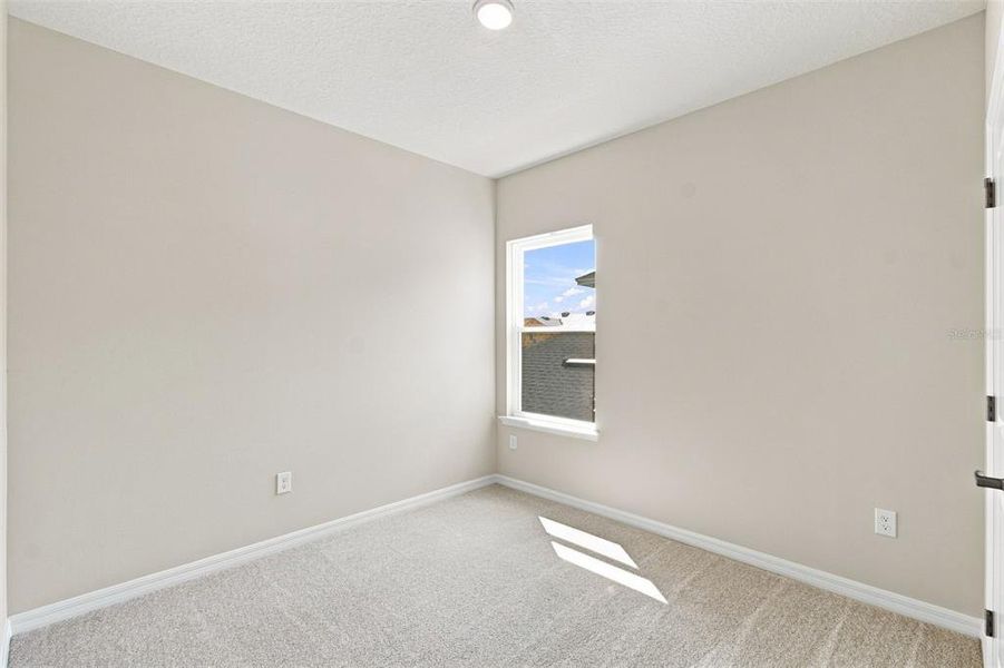 Spacious, unfurnished interior of a new home in Laureate Park at Lake Nona - Garden Series, Orlando (Image 19).