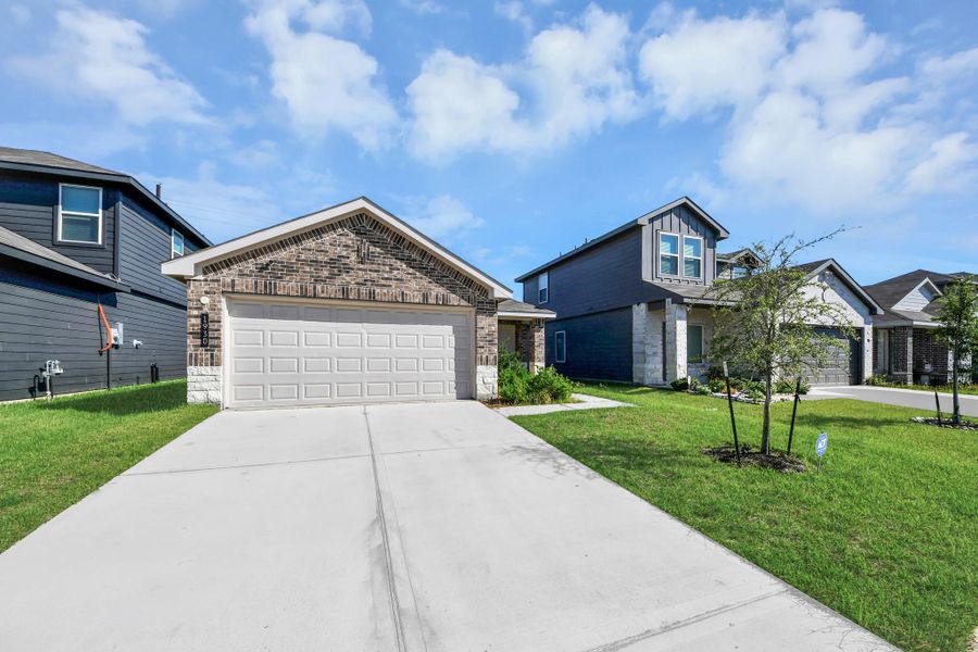 Front exterior of a new home in Legacy Park, Houston, TX, highlighting curb appeal (Image 25).