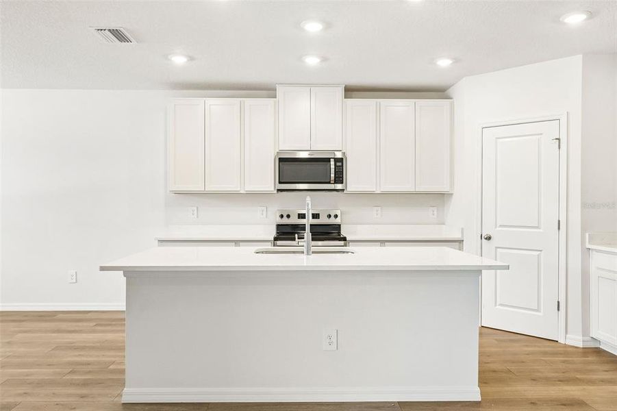 Furnished interior view inside a new home in Pine Ridge Meadows, Hudson (Image 30).