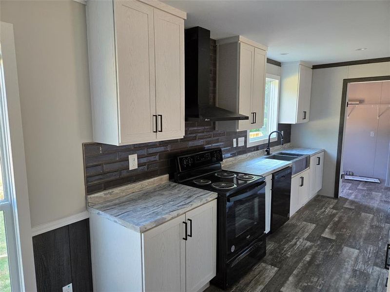 Furnished interior view inside a new home in , Pelican Bay (Image 9).