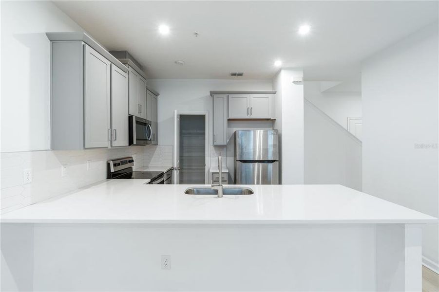 Furnished interior view inside a new home in , Orlando (Image 3). Furnished interior view inside a new home in , Orlando (Image 3).