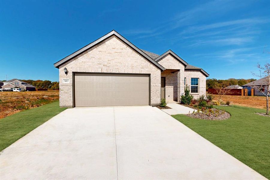 Front exterior of a new home in Kings Way, Denton, TX, highlighting curb appeal (Image 22).