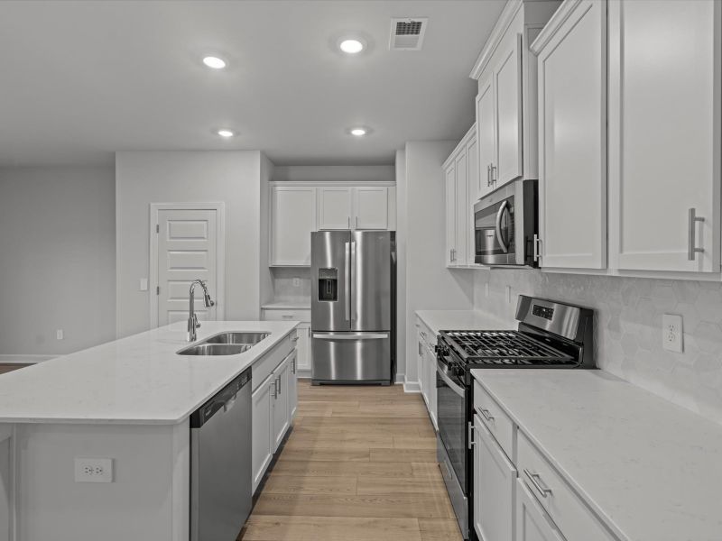 Furnished interior view inside a new home in Brayfield Manor - Heritage Collection, Wellford (Image 4).