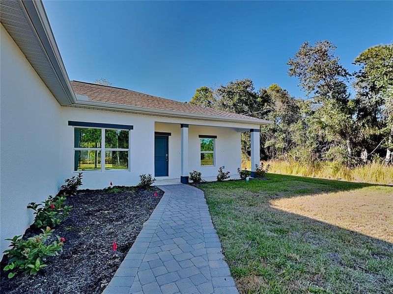Exterior details and patio area of a home in , Port Charlotte (Image 16).