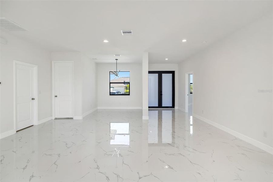 Spacious, unfurnished interior of a new home in , Port Charlotte (Image 40).