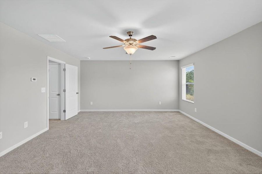 Spacious, unfurnished interior of a new home in The Reserve at Clocktower, Douglasville (Image 13).