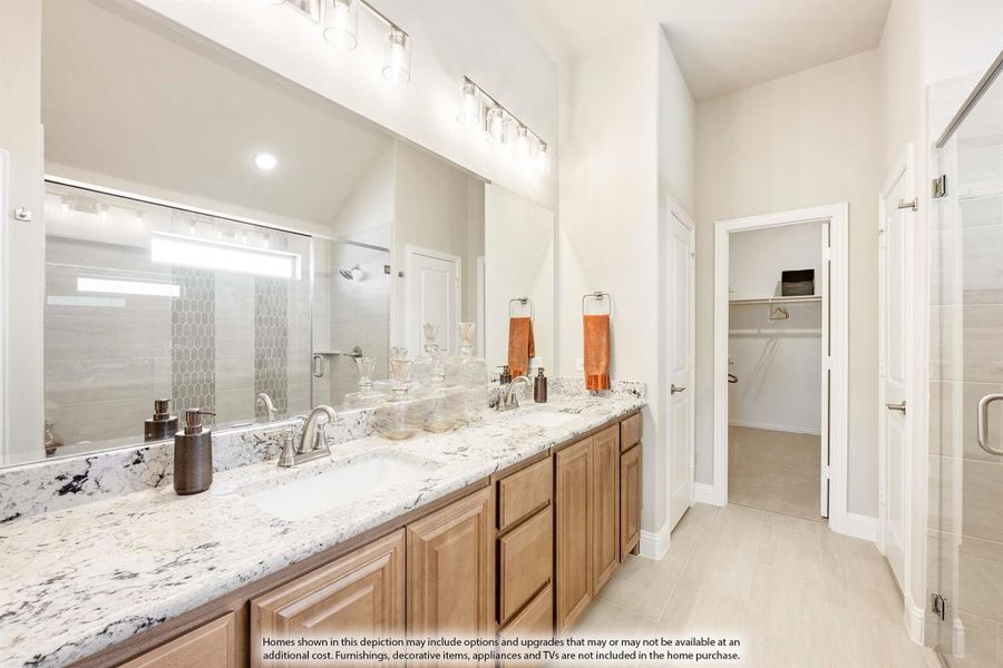 Master bathroom with double vanity, granite countertops, glass shower, and walk-in closet doorway visible.